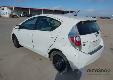 2014 Toyota Prius C One from USA, damaged, VIN JTDKDTB33E1561395